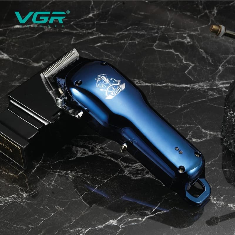 Акумуляторна машинка для стрижки (clipper) VGR V-679 BLUE, 4 насадки — фото 6